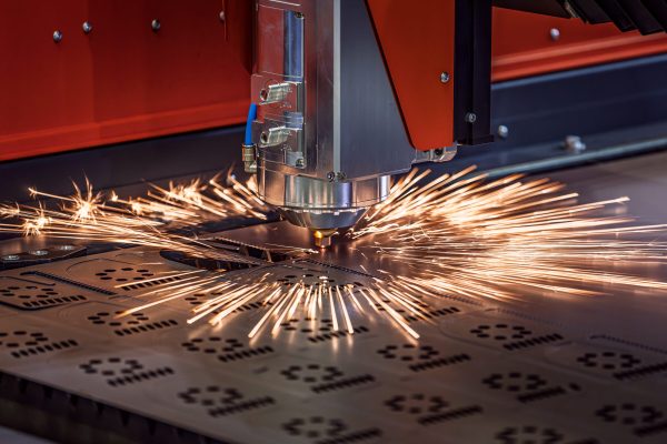 CNC Laser cutting of metal, modern industrial technology Making Industrial Details. The laser optics and CNC (computer numerical control) are used to direct the material or the laser beam generated.